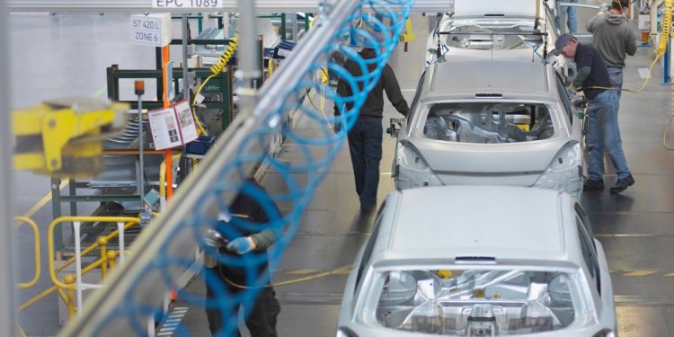 Cars on an assembly line
