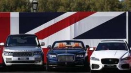 automobiles facing union jack flag