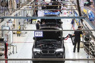 Germany sells even more vehicles to Britain rather than any kind of country, with 810,000 shipped just last year (BMW plant pictured)