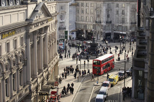 LONDON, THE UNITED KINGDOMT - MARCH 19: A double-decker coach journeys through Piccadilly Circus on March 19, 2012 in London, The united kingdomt. London's western End is synonymous with theater productions, containing over forty venues showing plays, musicals and operas, the theatres usually perform host to over 14 million spectators seeing over 18,000 performances every year. (Photo by Oli Scarff/Getty photos)