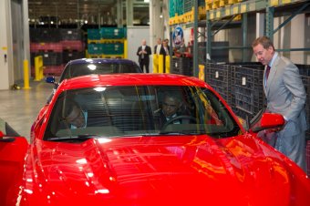 President Obama sits in a Mustang with Ford CEO Mark areas