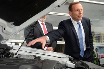 Tony Abbott visits a Ford dealership in Springwood