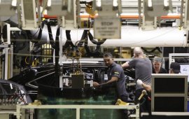 Workers assemble a Lexus SUV in the Cambridge, Ont., Toyota plant. Ontario and Michigan are preparing to join efforts to make their car companies much more competitive, as more manufacturing features shifted to your southern U.S. and Mexico.