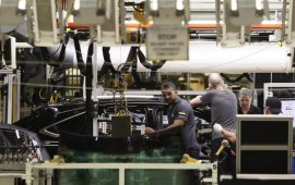 Workers assemble a Lexus SUV in the Cambridge, Ont., Toyota plant. Ontario and Michigan are preparing to join efforts to make their car companies much more competitive, as more manufacturing features shifted to your southern U.S. and Mexico.