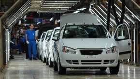Workers on Iran Khodro vehicle manufacturer make Iranian car models, and automobiles under permit regarding the French business Peugeot, on December 9, 2013 in Tehran, Iran. (Scott Peterson/Getty pictures)